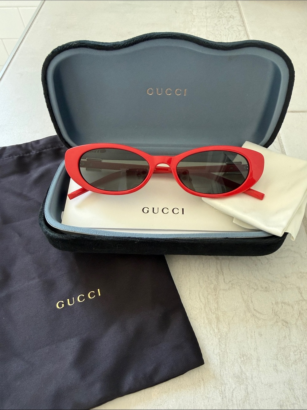 Gucci Red Cat-Eye Sunglasses with Dark Lenses